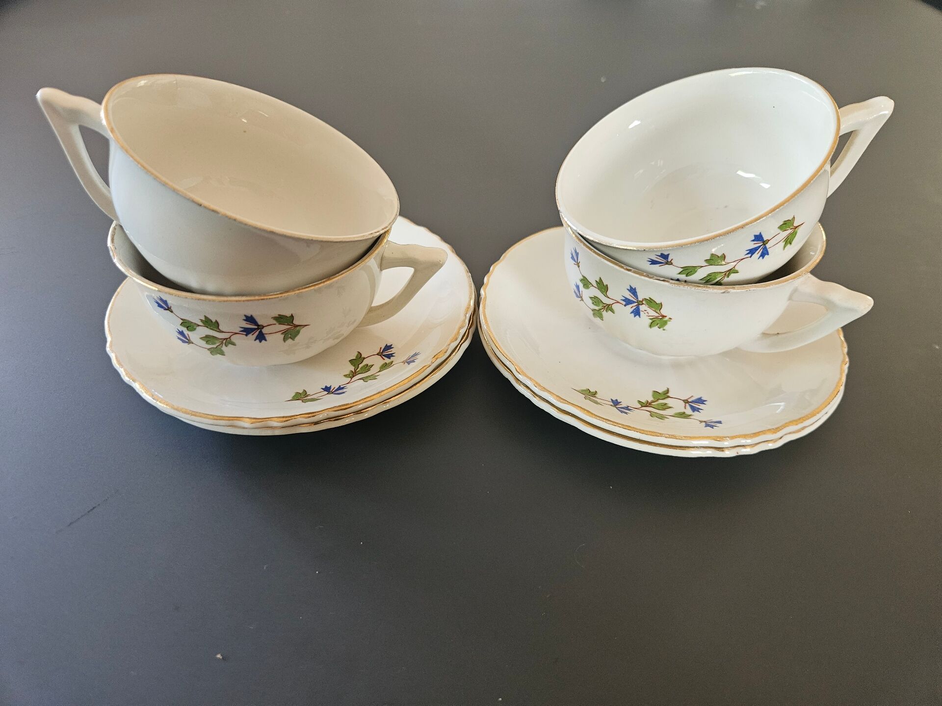 charming set of 4 cups and their 4 matching saucers in earthenware