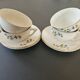 charming set of 4 cups and their 4 matching saucers in earthenware