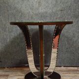 Art Deco guéridon resting on a central base made of stained wood.
