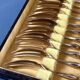 Brass and yellow galathite cake forks