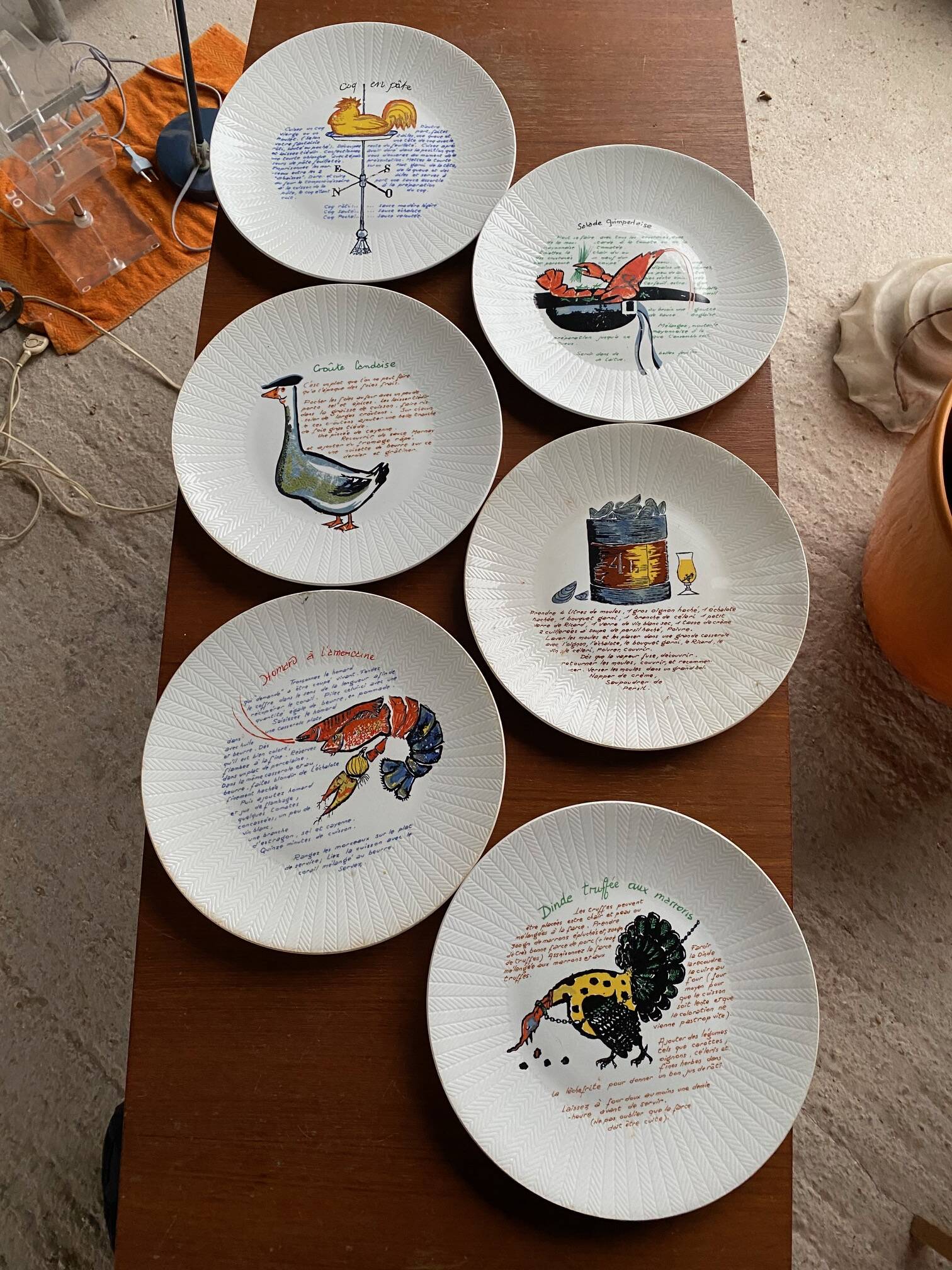 Series of 6 raymond oliver plates