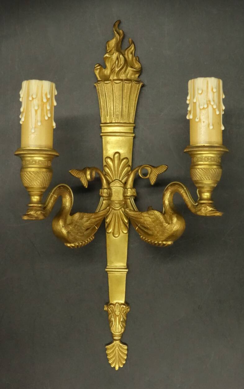 Pair of large wall sconces, torch and swans, Empire style - gilded bronze