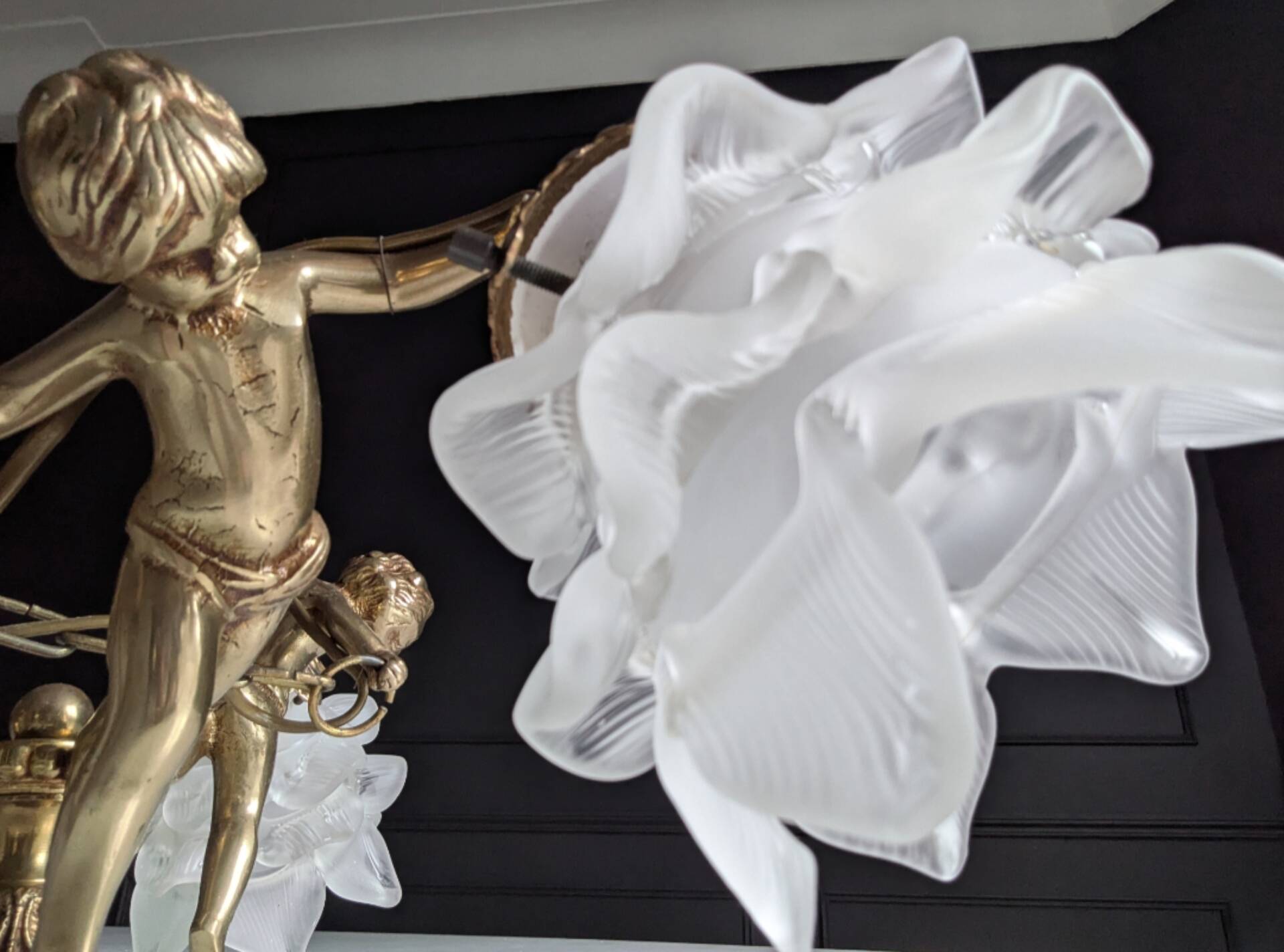 Vintage chandelier with cherubs and frosted glass flowers.