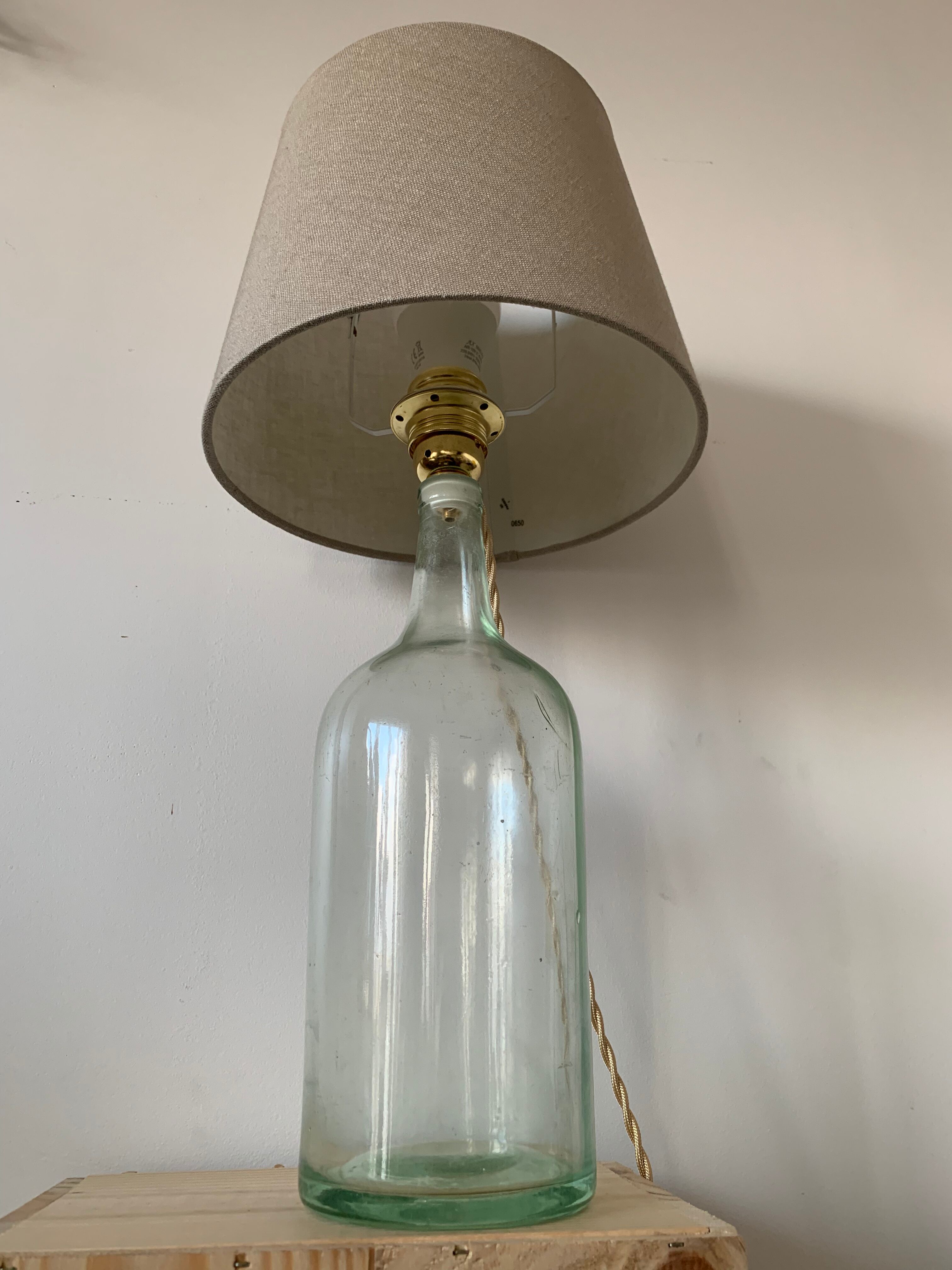 Old demijohn lamp