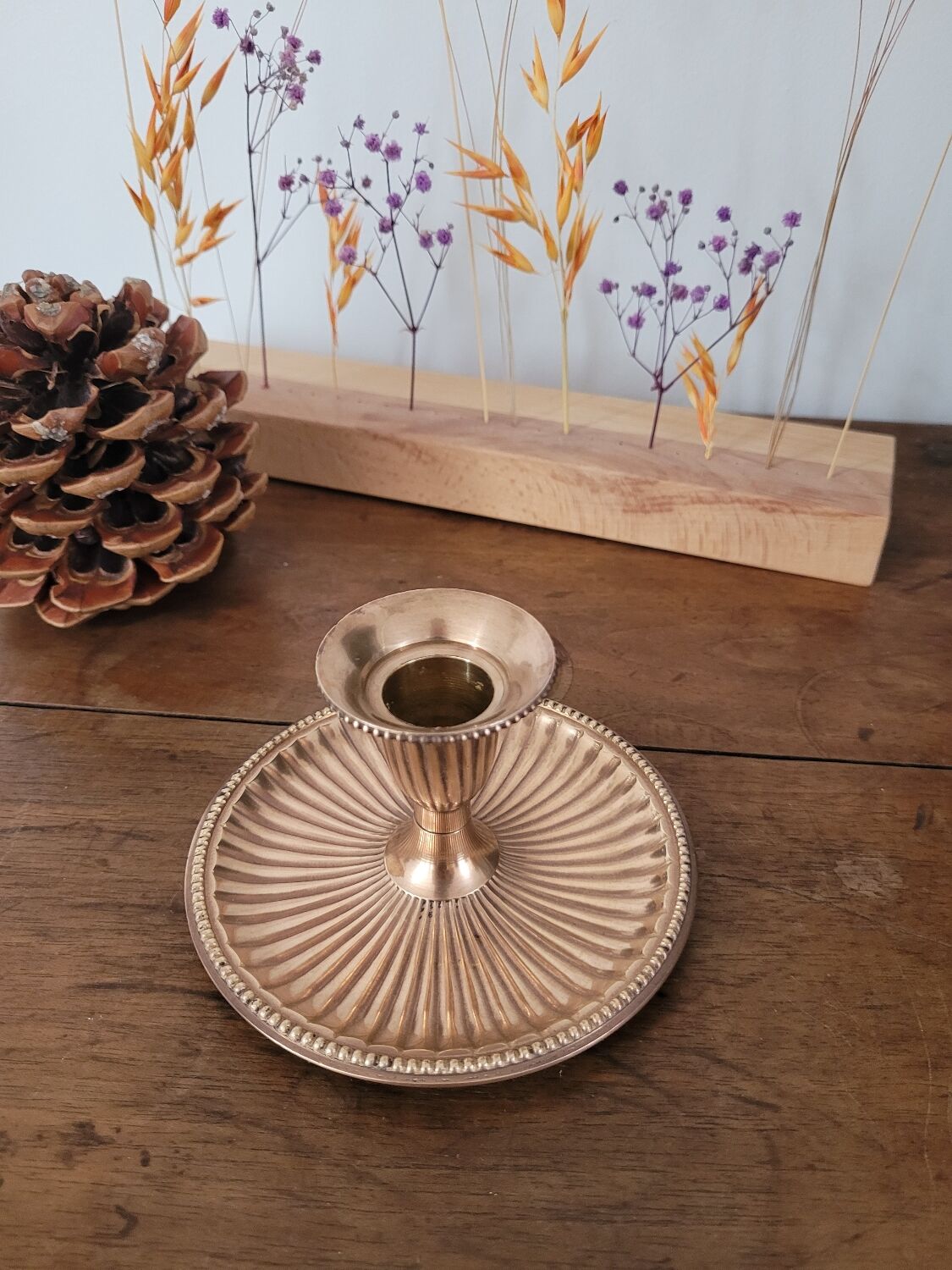 Brass candlestick with a ribbed dish