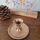 Brass candlestick with a ribbed dish