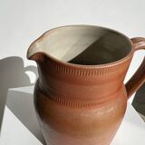 Handmade stoneware pitcher below H: 20cm