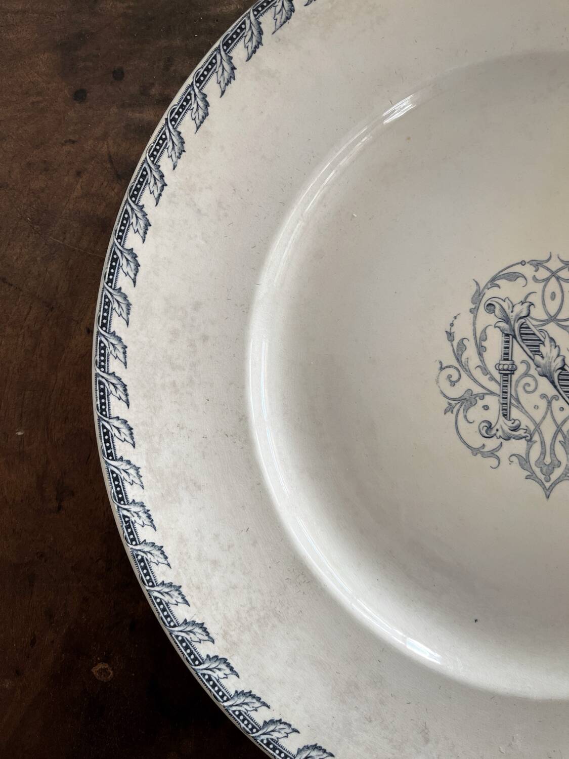 Round iron earth dish monogram “N” KG Lunéville