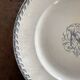 Round iron earth dish monogram “N” KG Lunéville