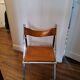 2 Chromed metal and leather folding chairs. 70s. Fontoni & Geraci