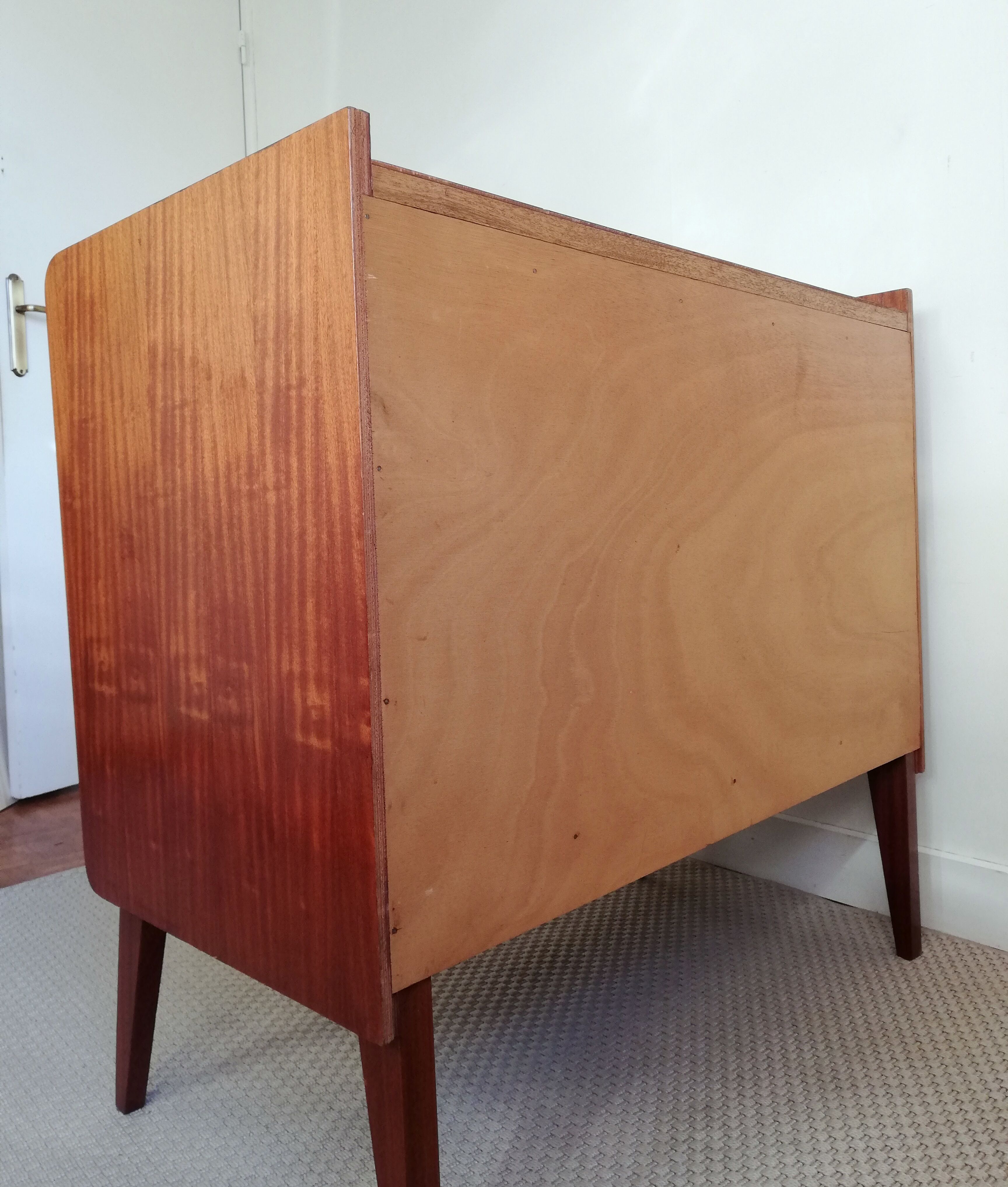 Teak and rattan chest of drawers feet compass