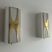 Pair of Loewy wall lights for Hilton, brass and Perspex, France 1965