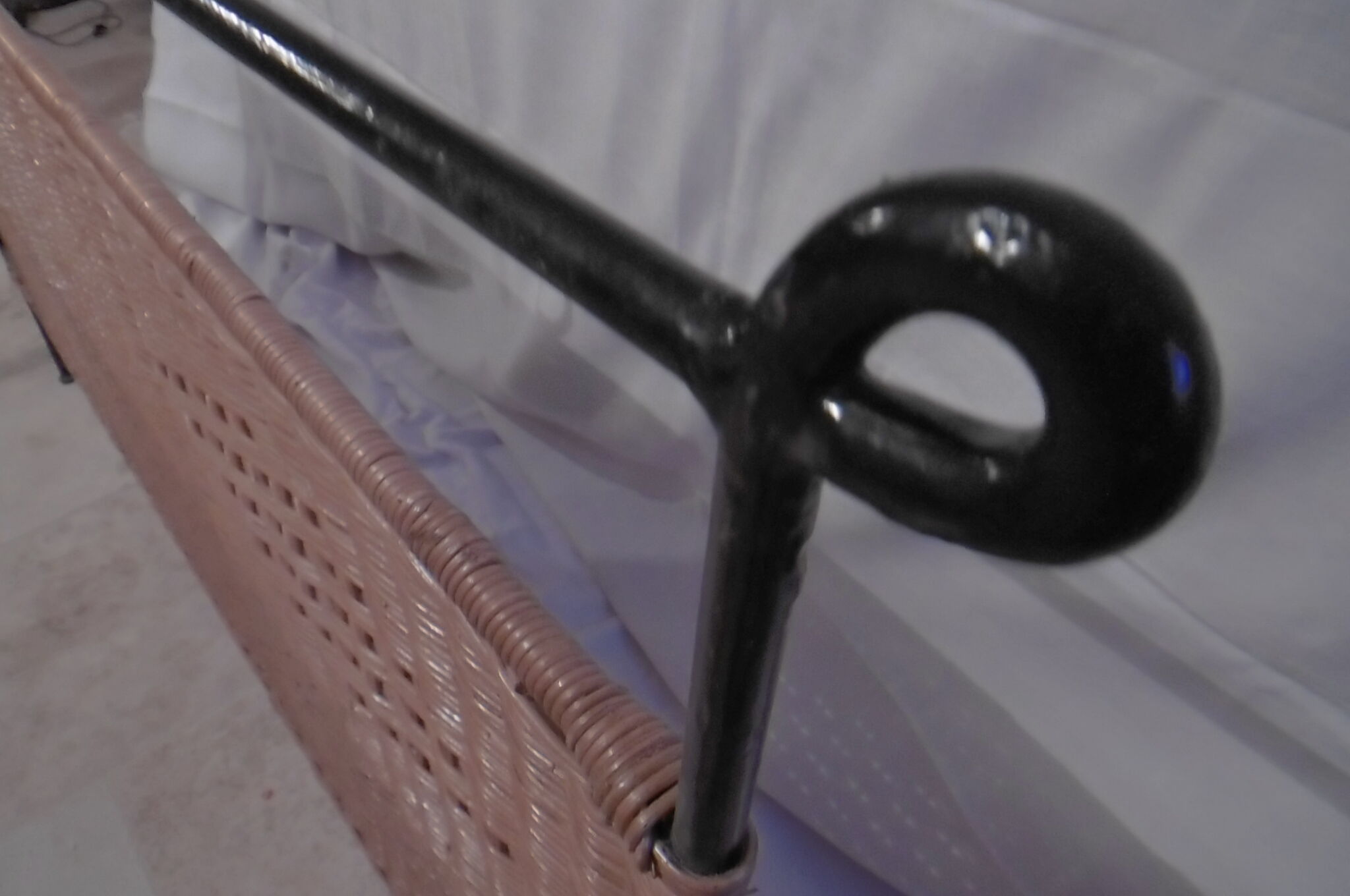 Black metal and rattan bed frame