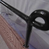 Black metal and rattan bed frame