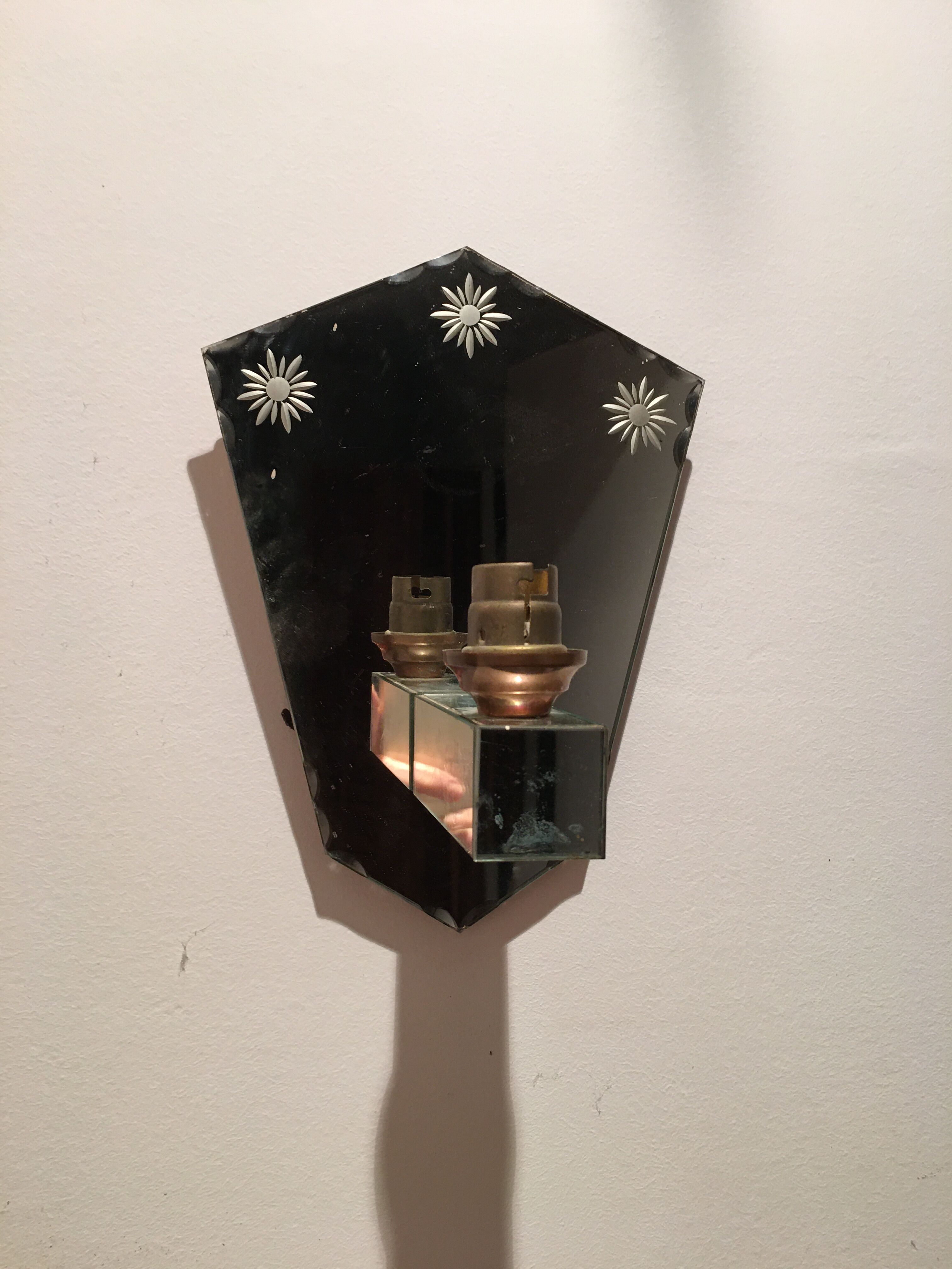 Pair of art deco sconces in venetian style mirror