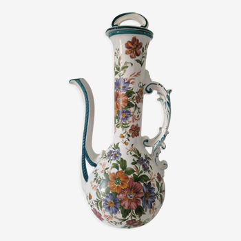 Old jug in flowered porcelain