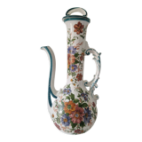 Old jug in flowered porcelain