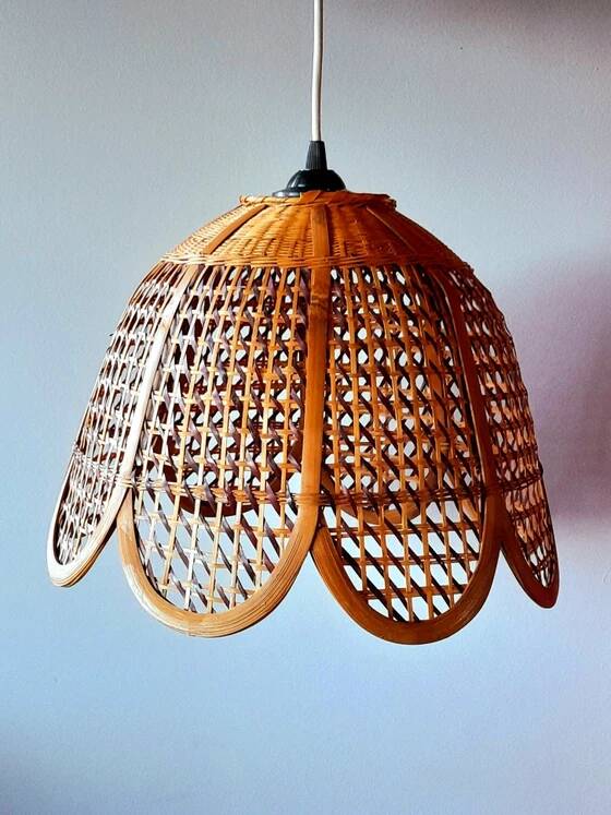 Hanging lamp in openwork bamboo