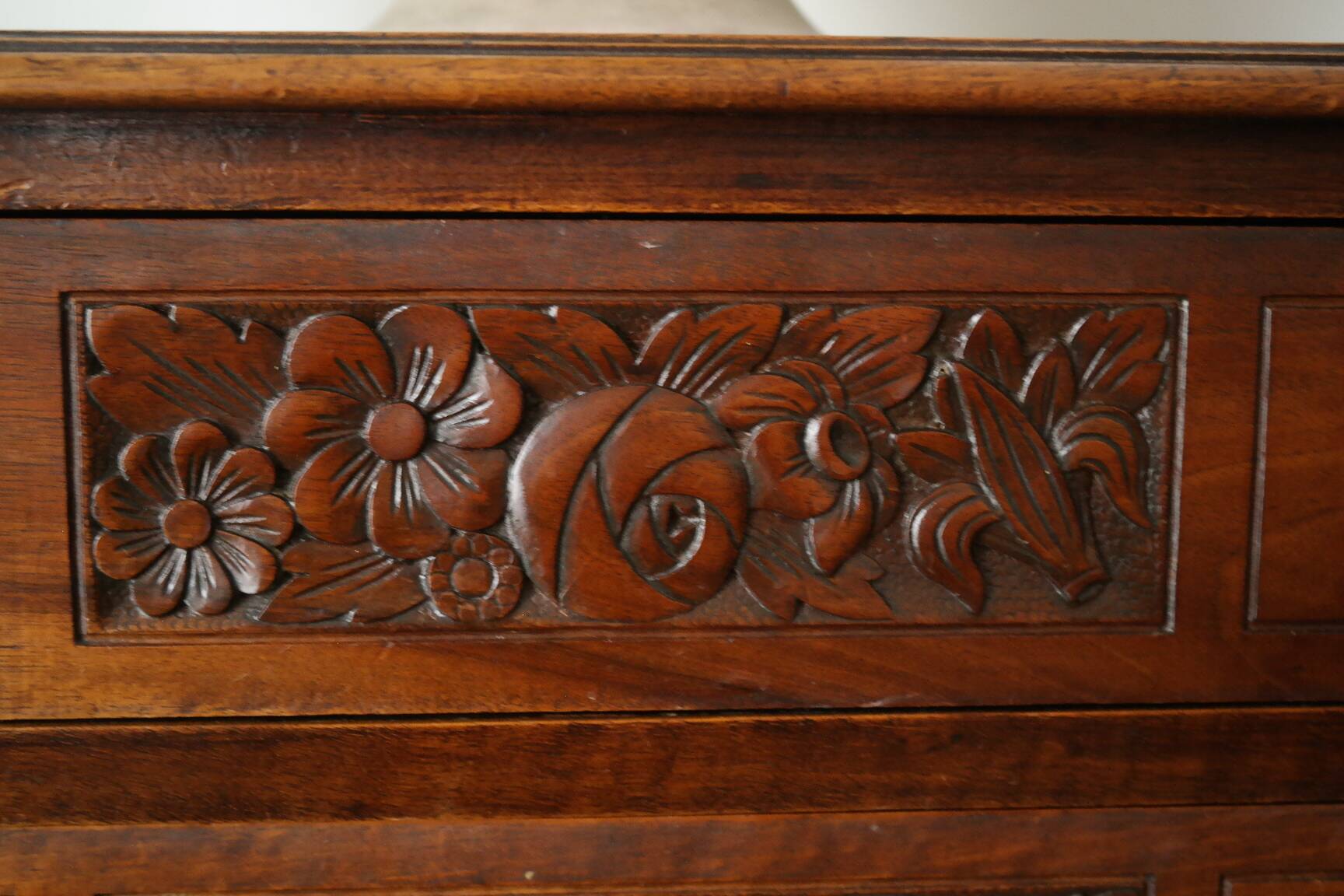 Solid walnut chest of drawers from the early 20th century.