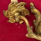 Paire d'appliques en bronze massif doré Rococo.