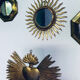 Miroir soleil doré