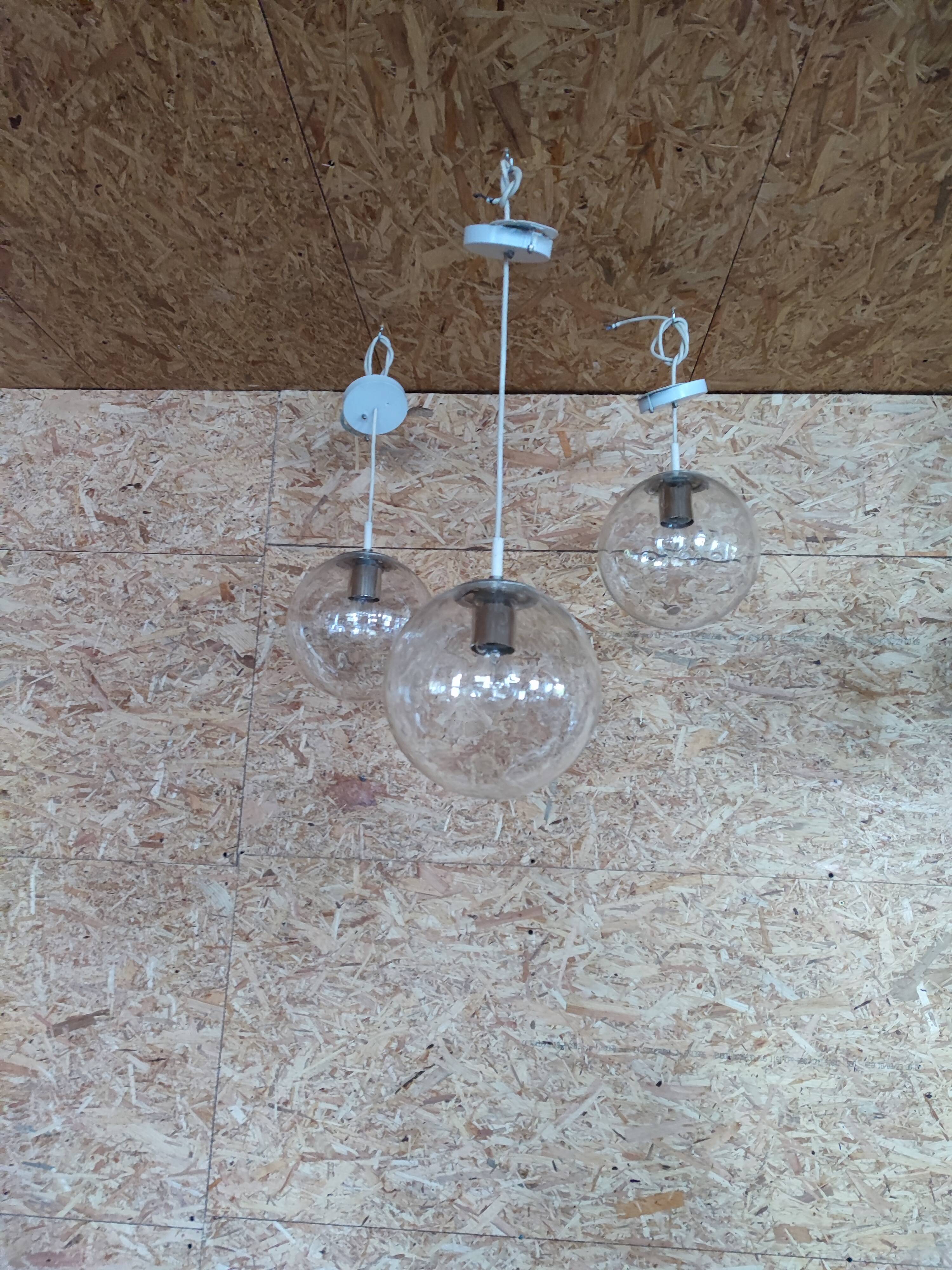 Bubbled glass globe pendant light. RAAK Amsterdam