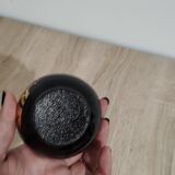 Black decorative vase with gold pattern
