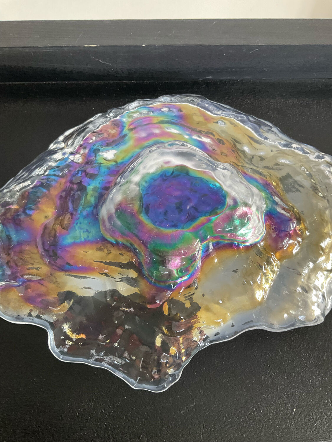 Empty vintage pocket in iridescent glass