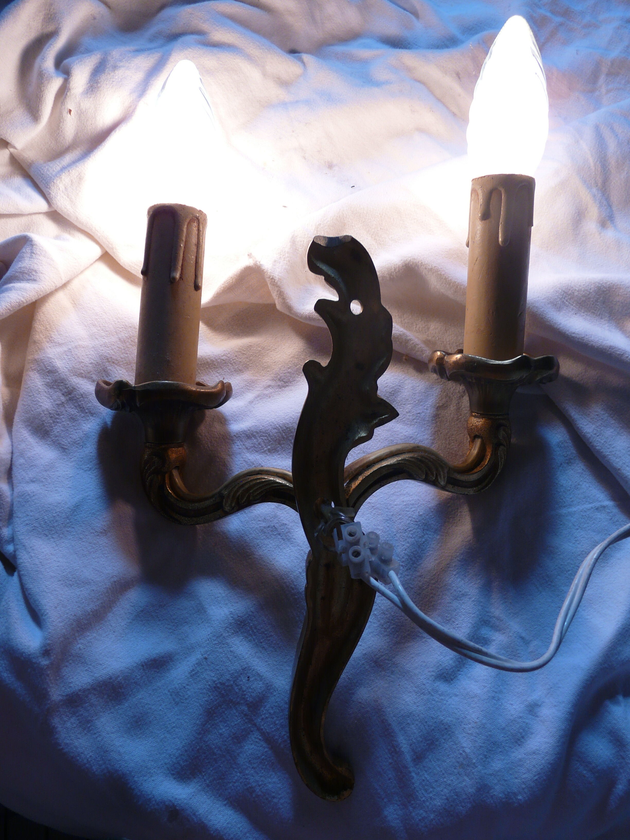 Two pairs of bronze wall lamps