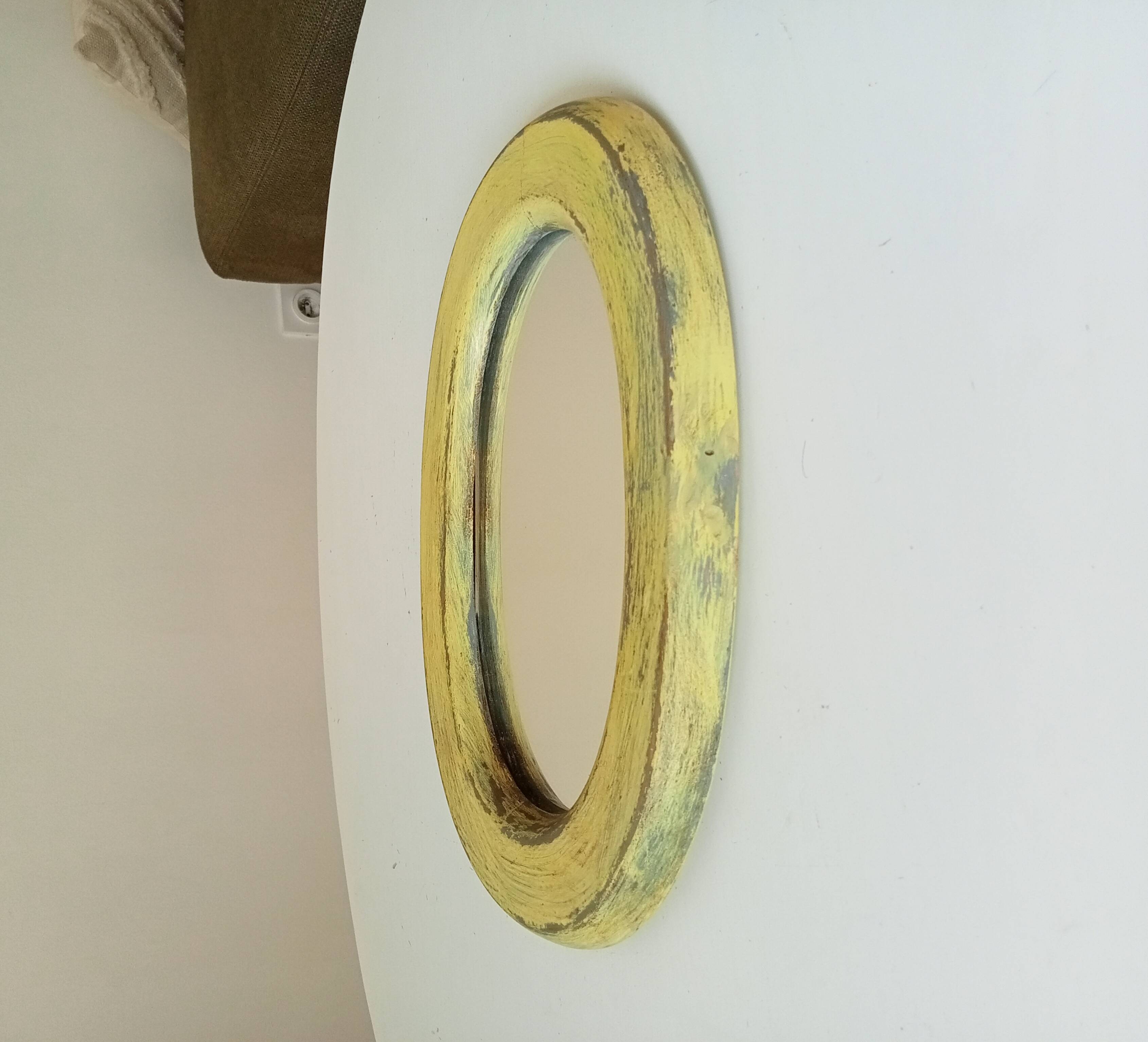 Small antique oval mirror