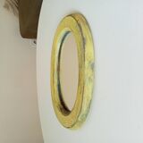 Small antique oval mirror