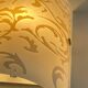 Polished and screen-printed glass sconce by eglo