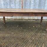 Antique farmhouse table in solid oak with tapered legs and 1 drawer at the end.