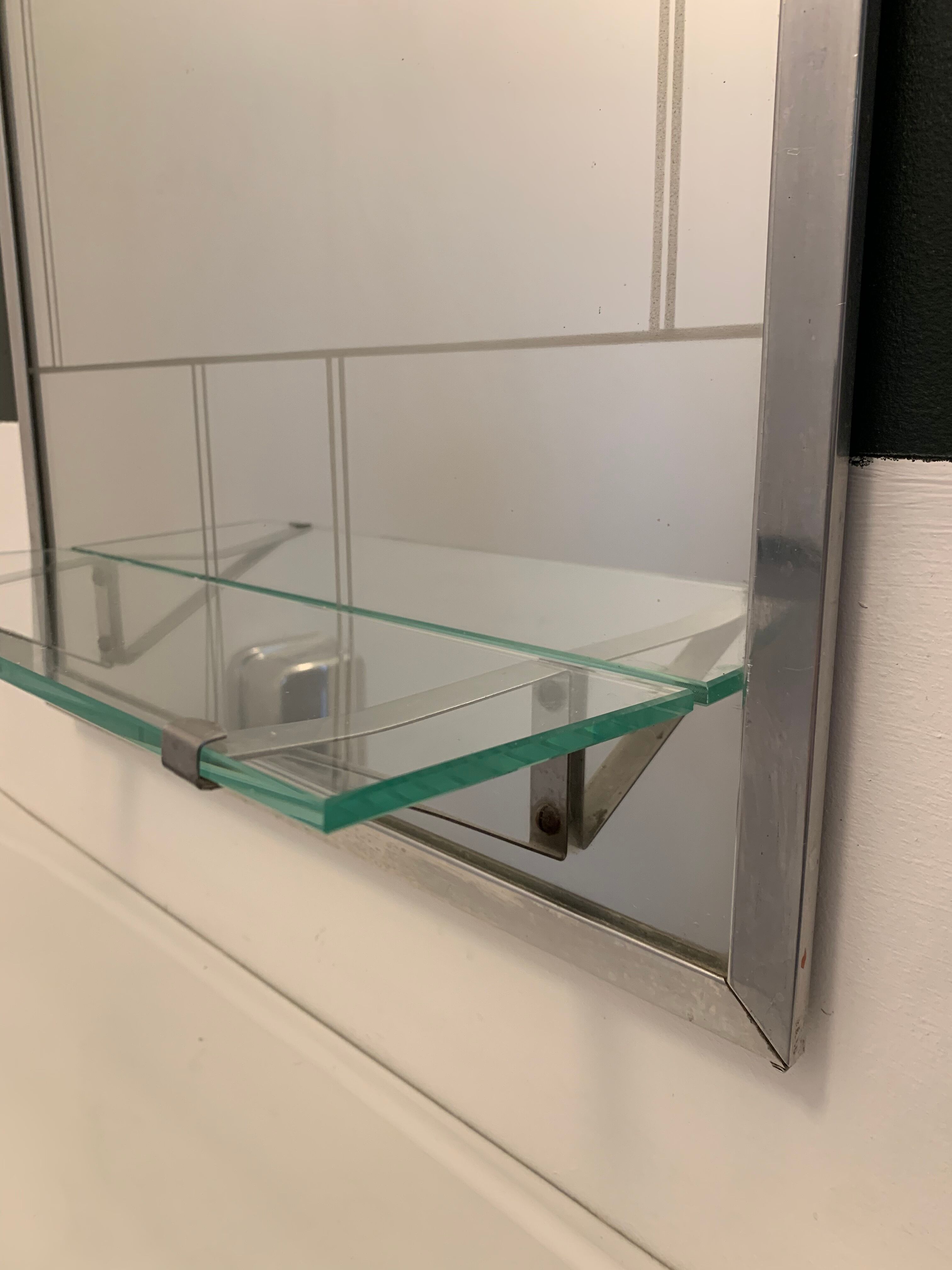 Bathroom mirror with art deco shelf
