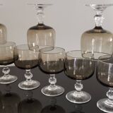 9 white wine glasses on vintage Luminarc smoked black stem