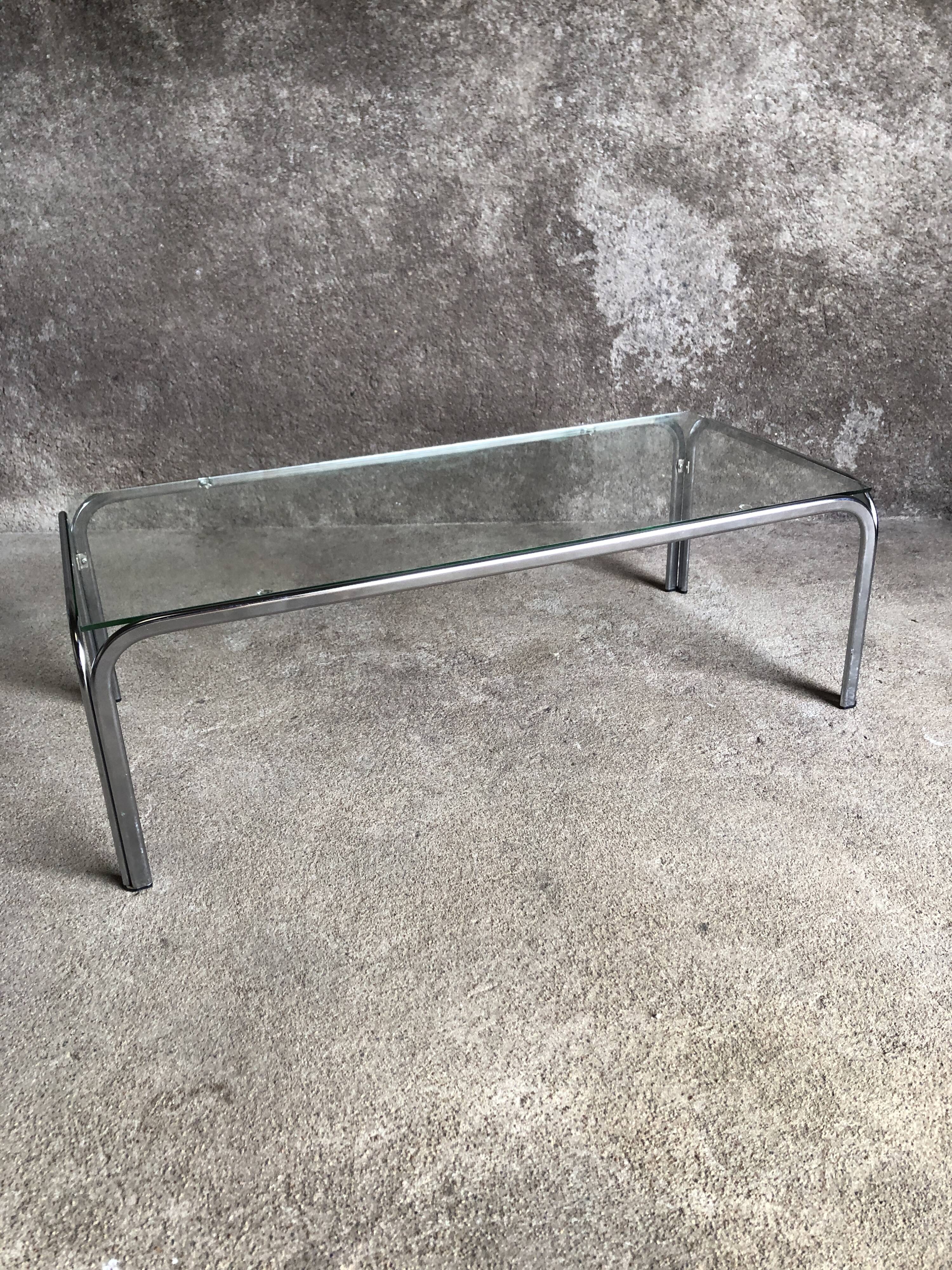 Coffee table with chrome legs and glass top, 1970