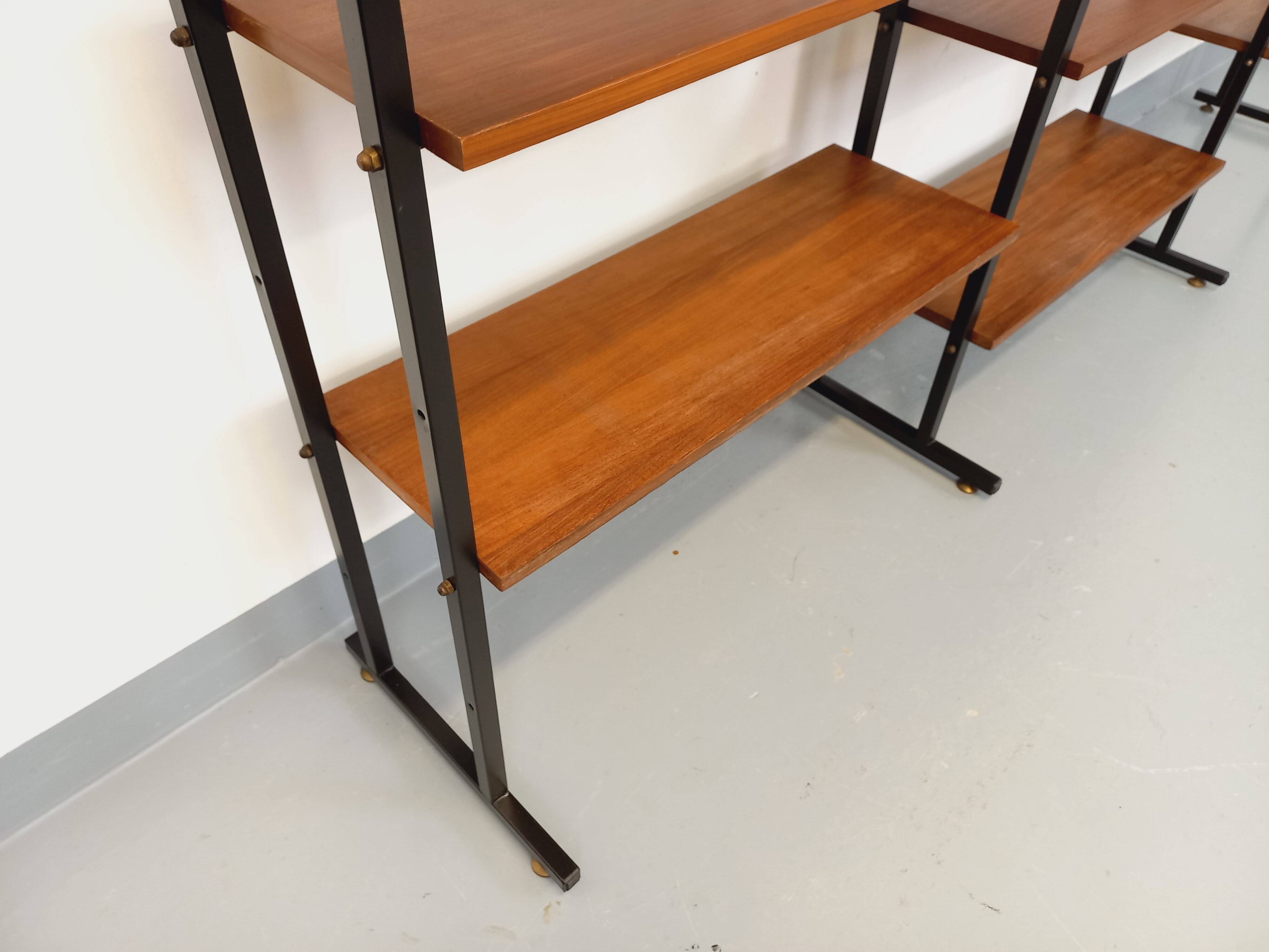 Vintage Italian triple modular bookshelf in teak and metal.