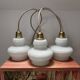 Lot de trois suspensions scandinaves en opaline blanche