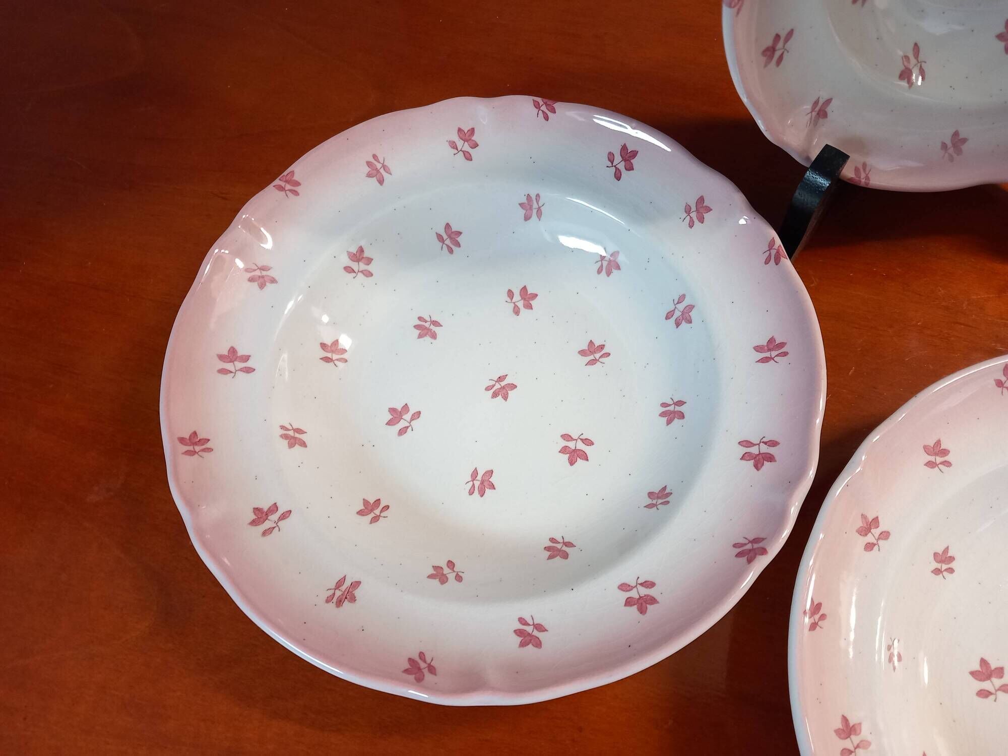 Set of 4 antique deep plates from St Amand in the "Vine Leaves" pattern.