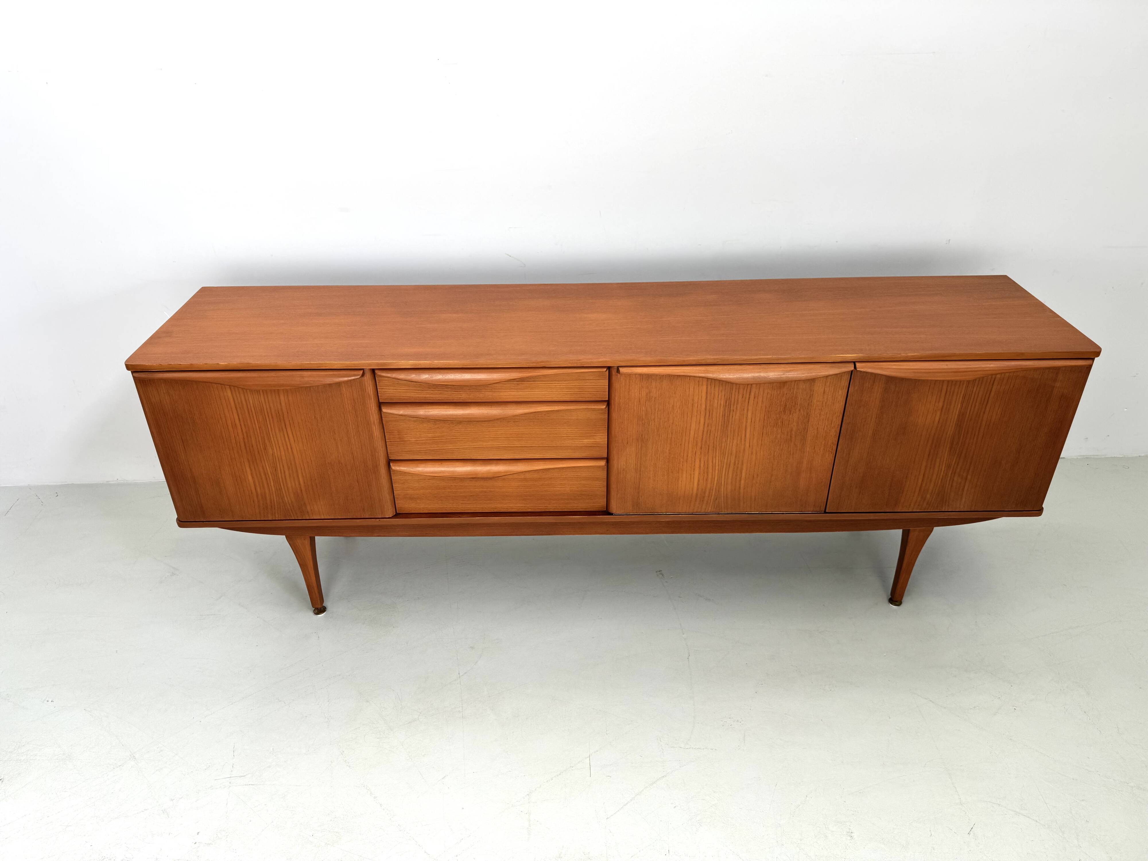 Beautiful and unique Stonehill sideboard from the 1960s made of teak wood.
