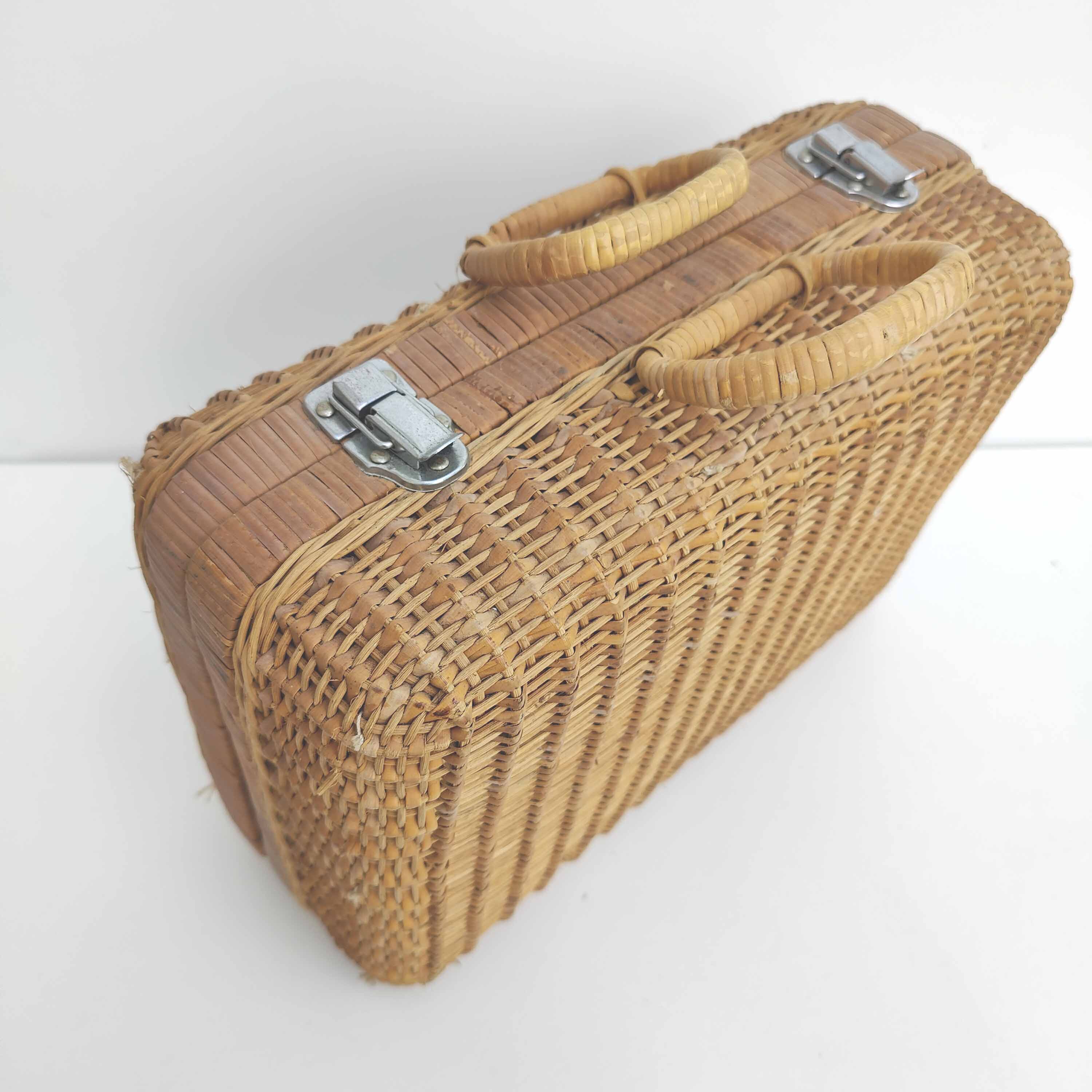 Rattan suitcase and wicker interior flowered
