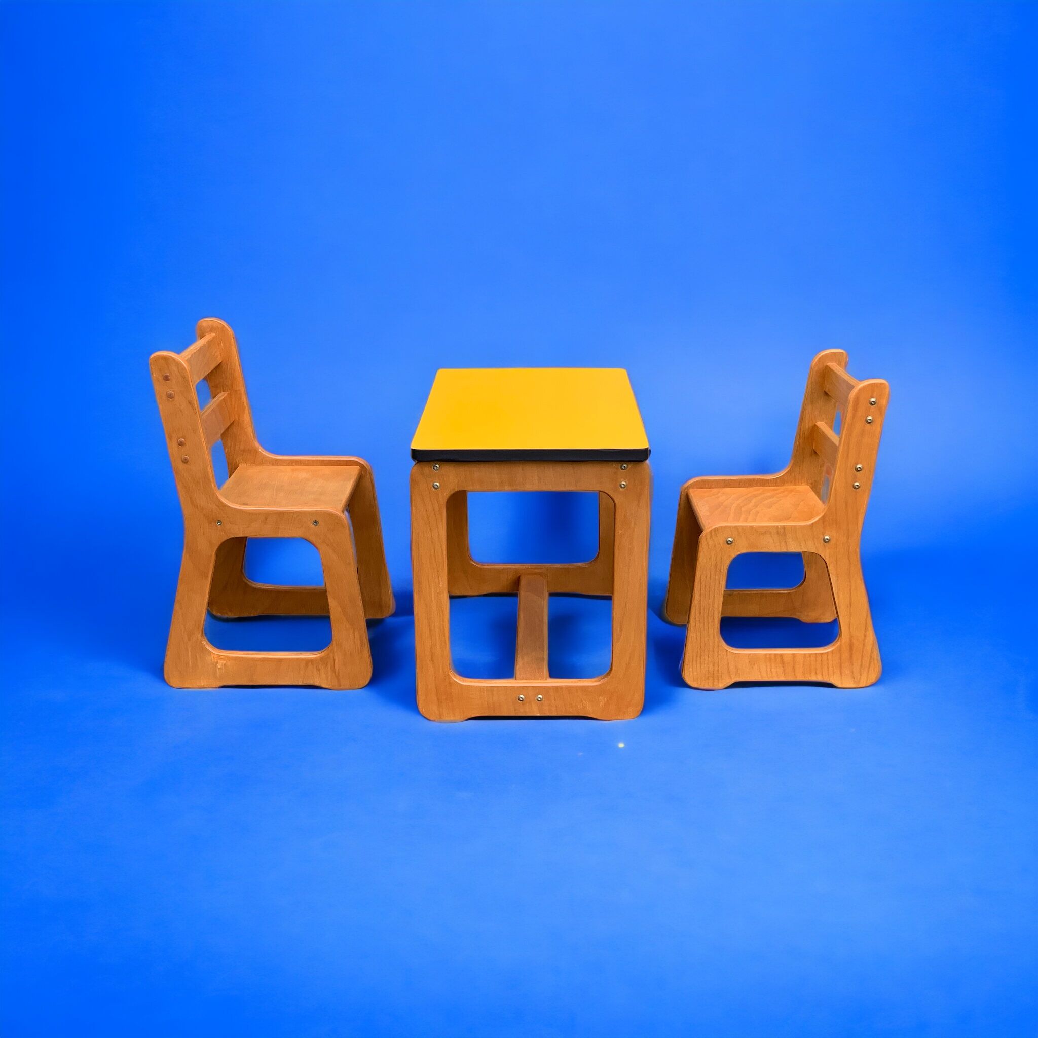 Children's wooden and formica desk and sled chairs 1970