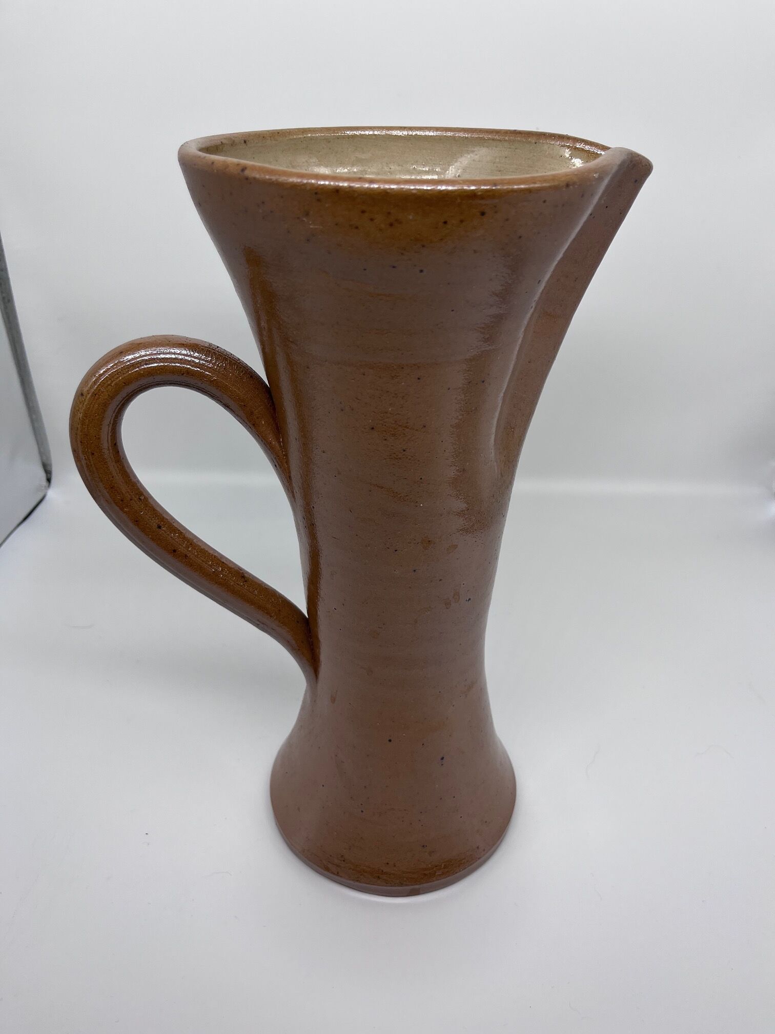 Pitcher in sandstone