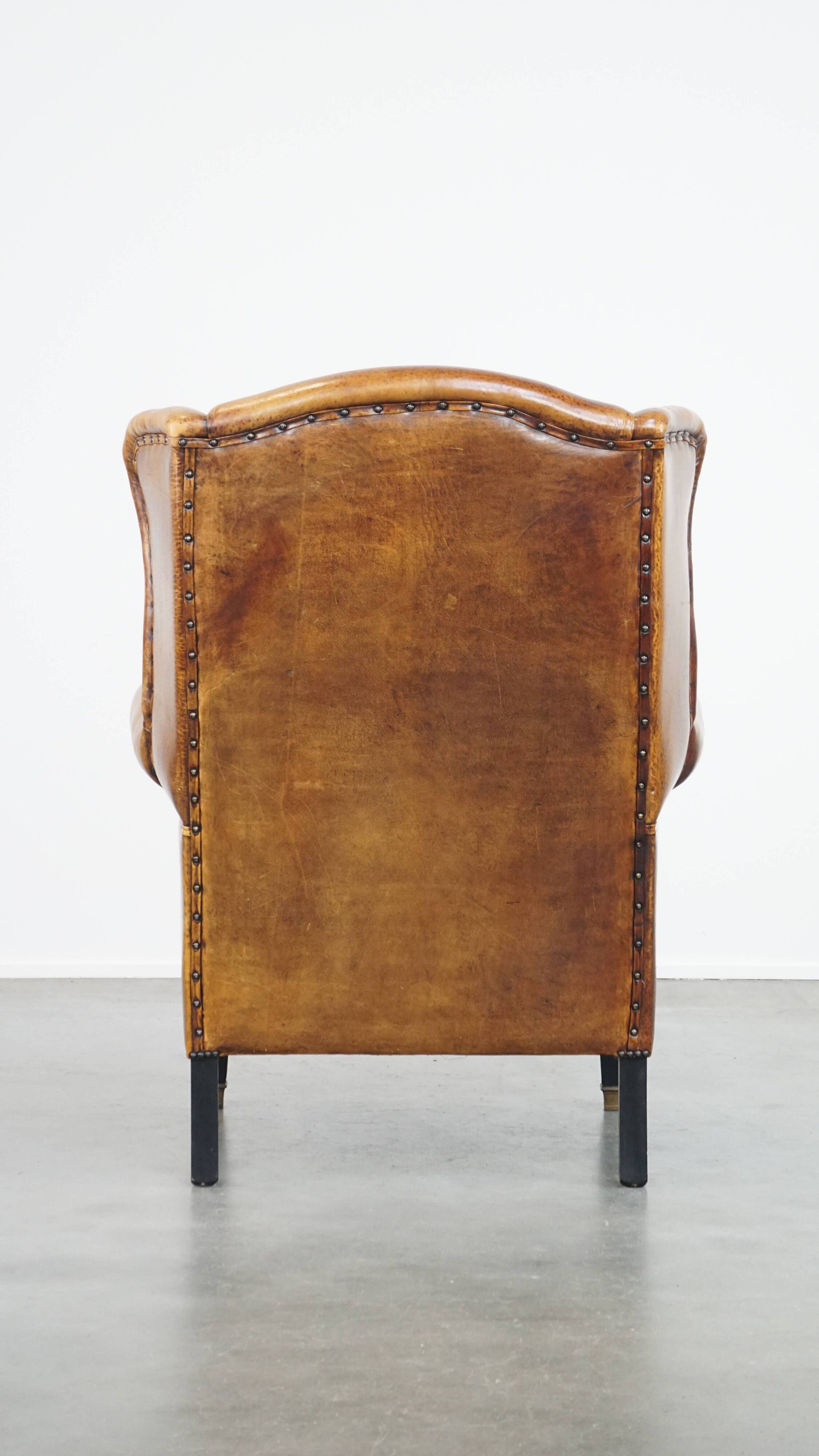 Fauteuil à oreilles en cuir de mouton vintage de style anglais