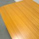 Vintage veneer table with pretty angular legs and brass at the base of the legs.