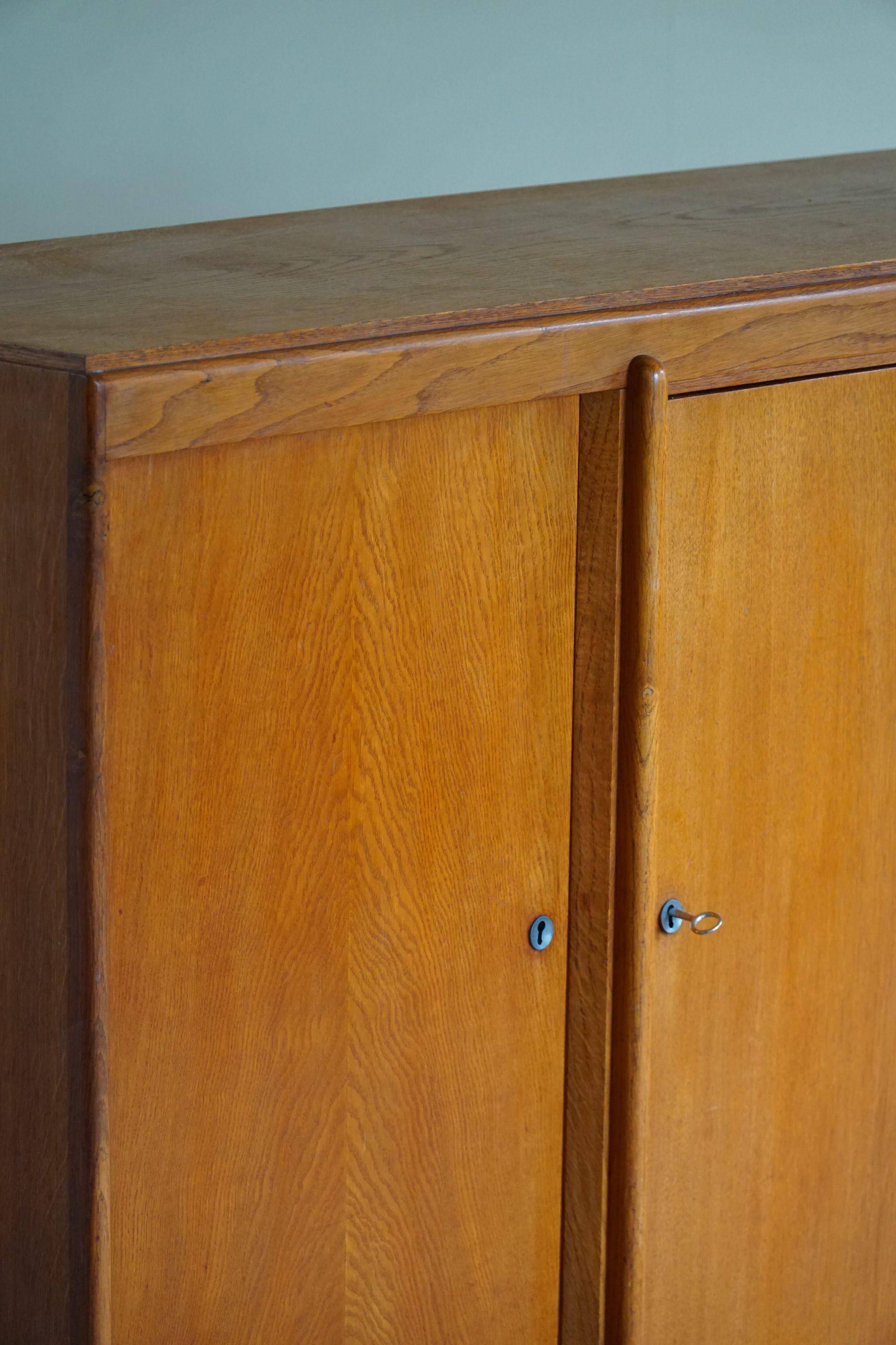 Mid-century buffet/enfilade in teak and oak, Danish cabinetmaker, 1960s