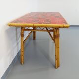 Vintage dining table in rattan and ceramic from Vallauris from the 50s and 60s