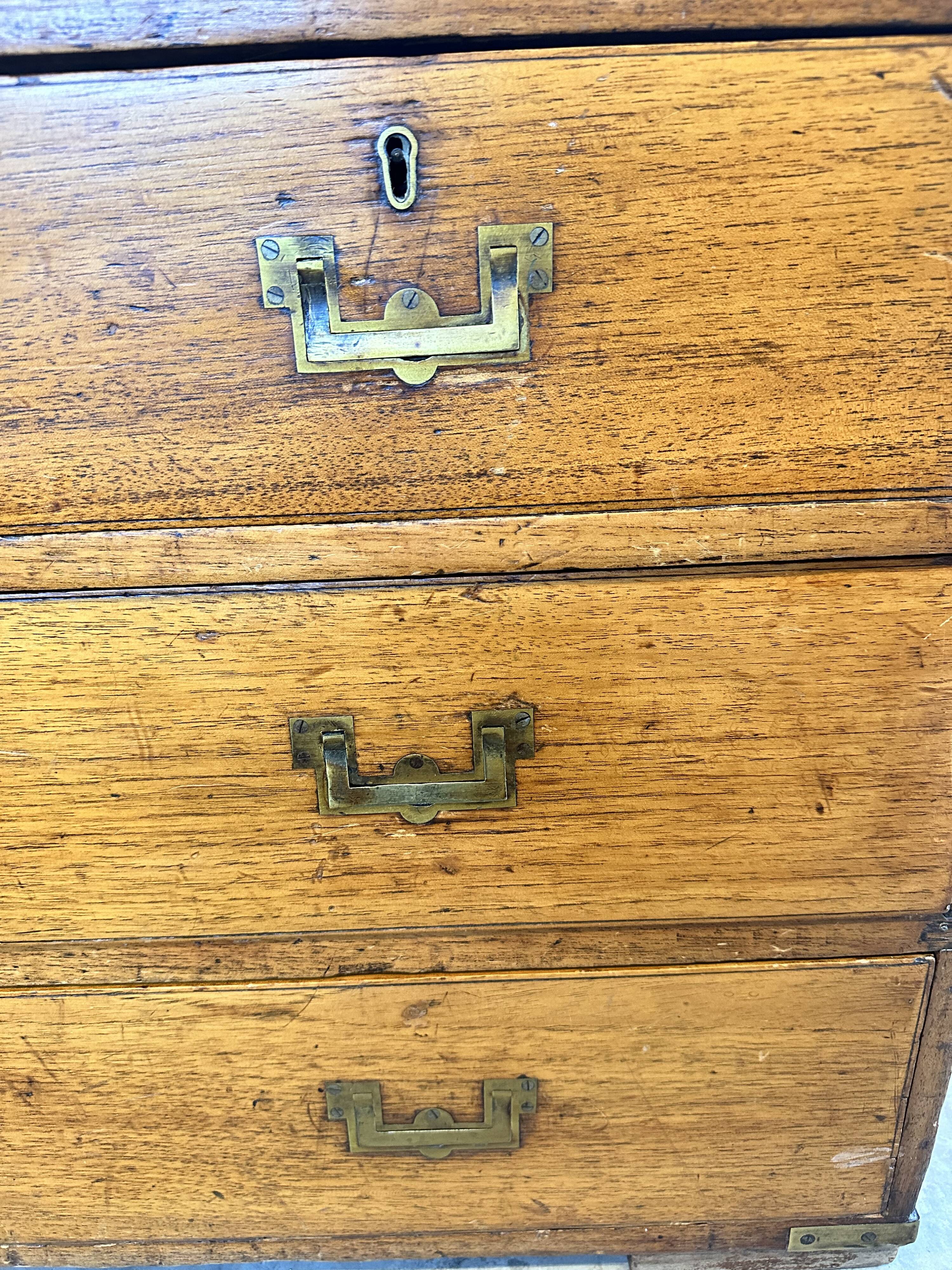 Small marine chest of drawers in wood and brass