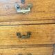 Small marine chest of drawers in wood and brass