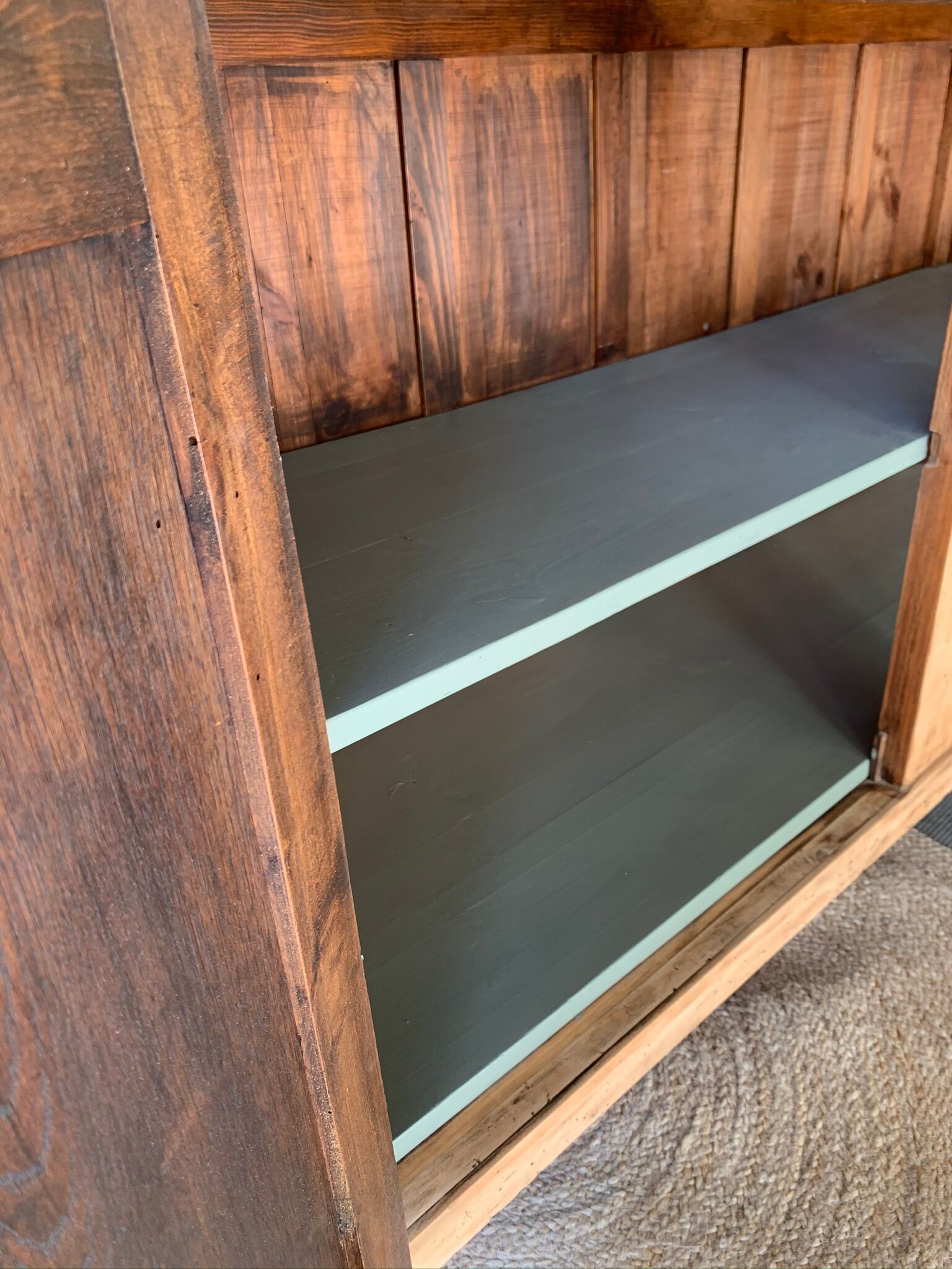 Green buffet and raw wood